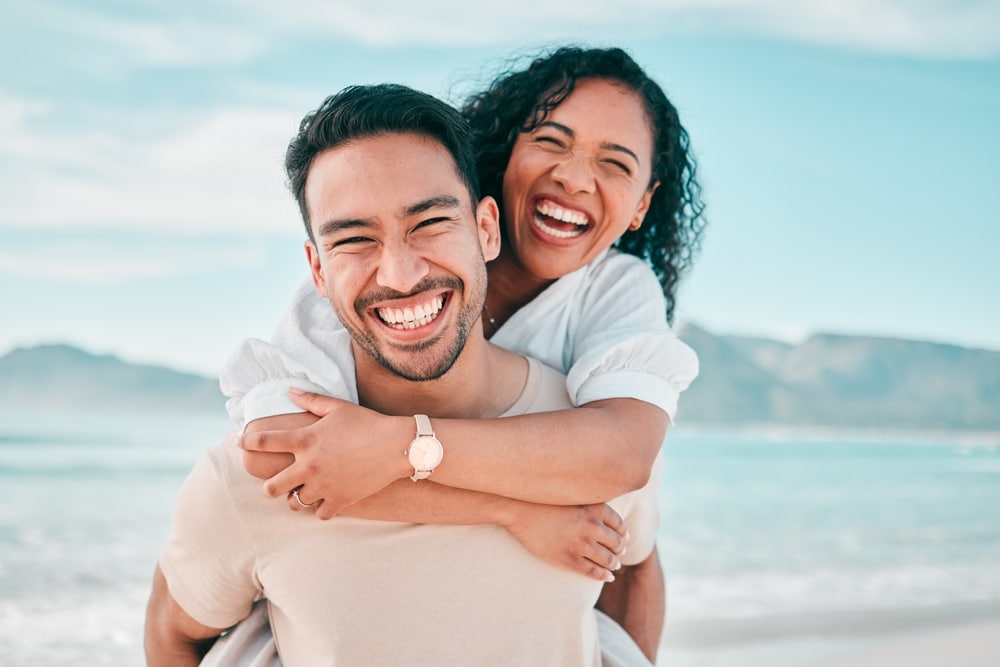 Happy couple enjoying a day at the beach.