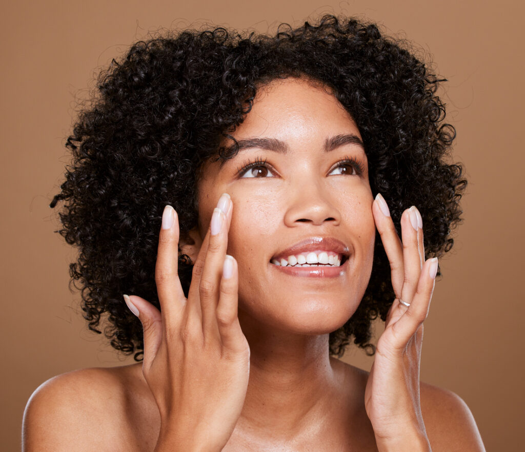 Woman with smooth, youthful skin after BOTOX® Cosmetic treatment.